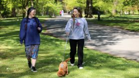 Volunteer and Mentor walking dog