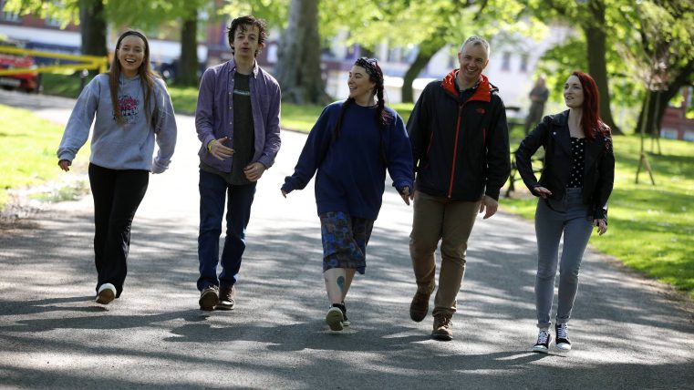 Macs Volunteers walking through a park