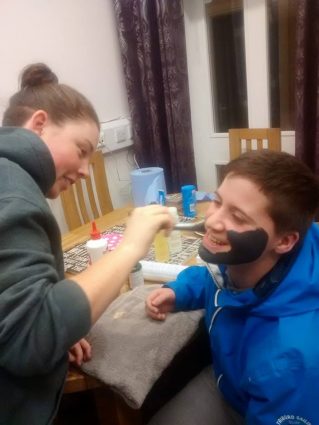 Young people putting on Facemasks